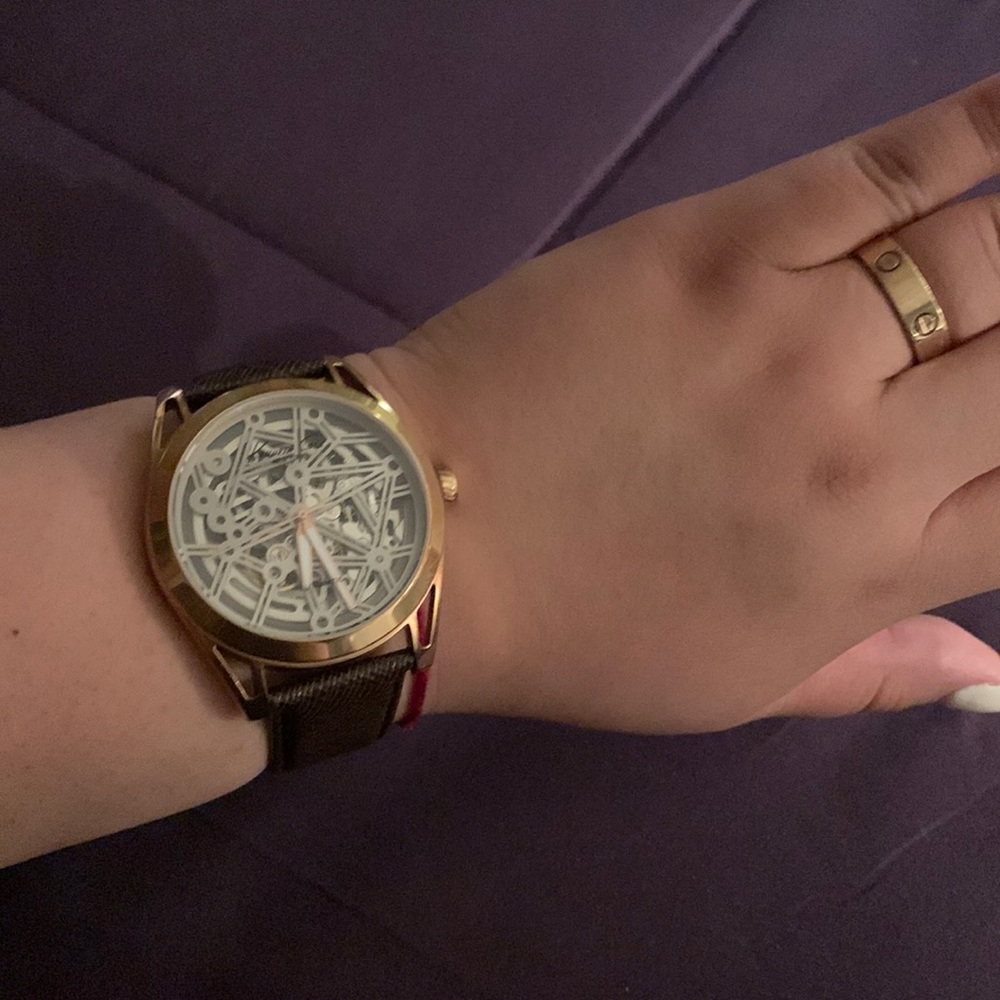 Kenneth Cole rose gold Skelton automatic watch